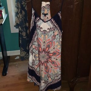 Colorful sundress perfect for any occasion! 🧡